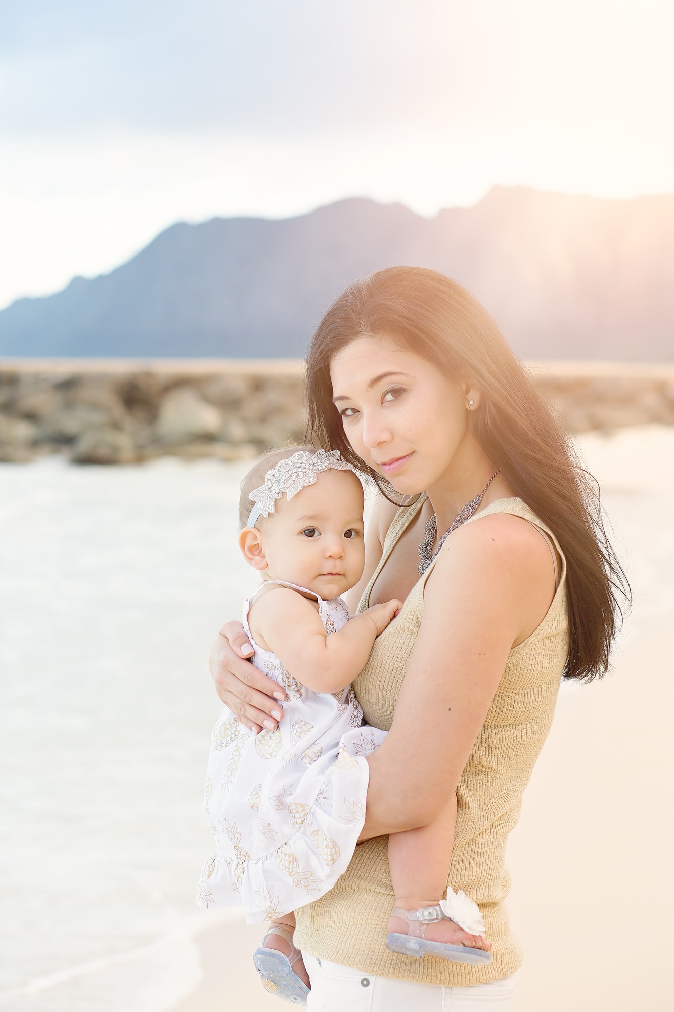 mom and daughter on beach
